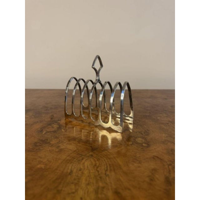 Pretty antique Edwardian silver plated toast rack, having a pretty quality antique Edwardian silver plated toast rack with...