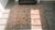 Textile 1930s Beige Geometric Tribal Antique Indian Cotton Agra Rug 6'2" X 8' Handknotted Wool Carpet For Sale - Image 7 of 9