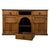 An exceptional and beautifully crafted 20th-century dresser base, finely constructed in golden oak and distinguished by...
