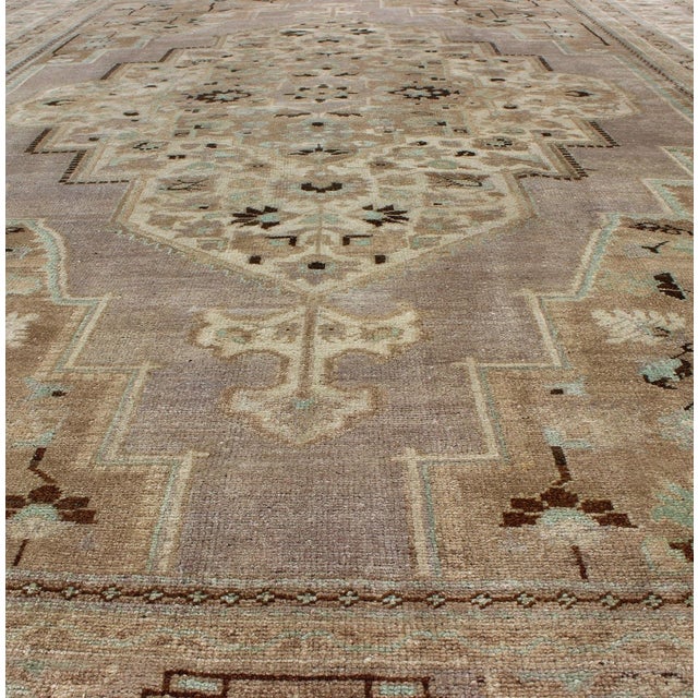 Tribal Vintage Turkish Floral Medallion Oushak in Earth Tones, Lavender, and Ice Blue 7'2 X 11'0 For Sale - Image 3 of 9