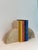 We are very pleased to offer a pair of sculptural bookends, circa the 1980s. Crafted from solid travertine, each piece is...