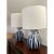 This is a pair of Aerin Gannet table lamps in the Drizzled Cobalt finish, shades not included. Ceramic glazes will vary in...