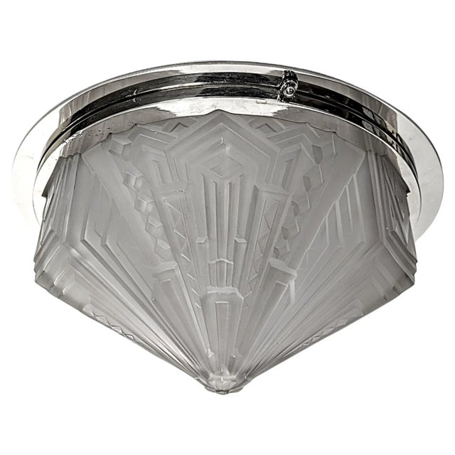 A very unusual hard to come by French Art Deco flush mount was created by "Genet & Michon". The shade is enhanced by...