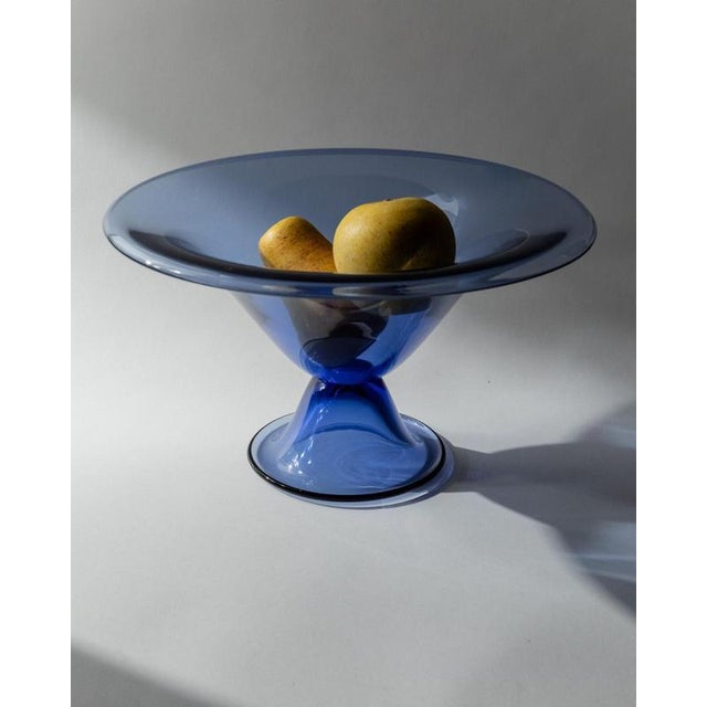 This large vintage Murano glass bowl from 1980s Italy is an elegant example of Italian art glass design in royal blue....