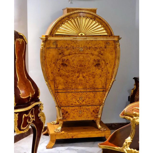 A truly distinctive statement piece, this Viennese Biedermeier-style secrétaire features an elegant architectural...