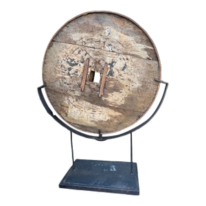Antique Carved Wooden Wagon Wheel Sculpture Mounted on Iron Base.