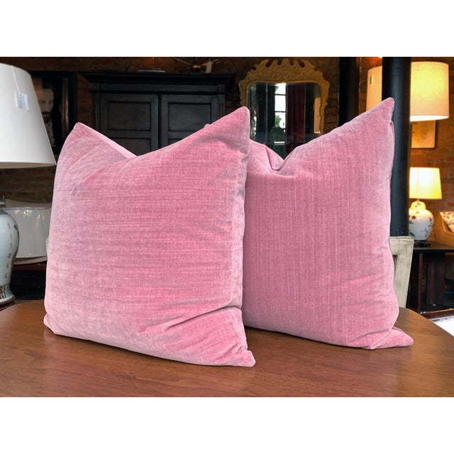 A pair of new custom square pillows exclusively made for Cafiero Select. The fabric is a cozy mauve-pink, velvet mohair....