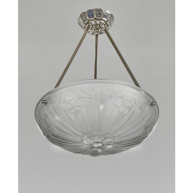 SONOVER A nice French art deco pendant in nickel plated solid brass or bronze made around 1930. It holds a Sonover signed...