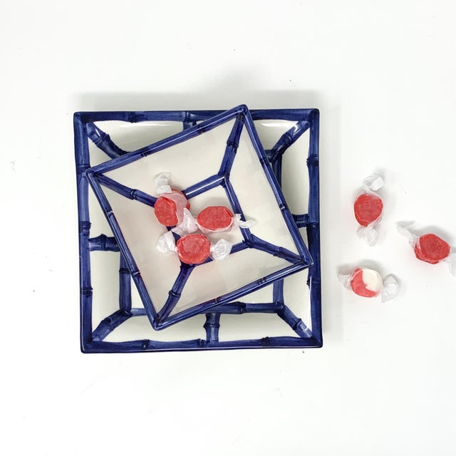 A ceramic tray hand-painted in Italy to resemble woven bamboo fretwork, with visible brushstrokes rather than a printed...