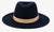 Elegant Janessa Leoné structured wool fedora in deep navy, finished with a rich caramel genuine leather band. A timeless,...