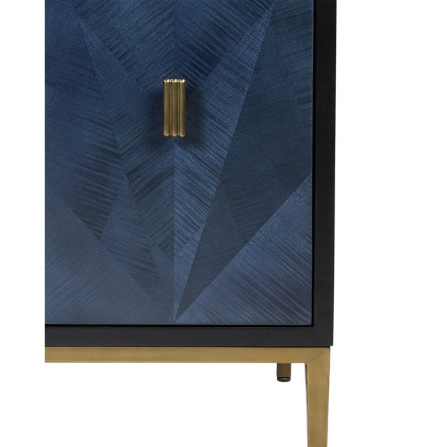 The Kallista 30" Blue Vanity has a dark sapphire blue finish that enlivens the sycamore veneers on its door fronts. The...