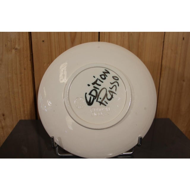 Pablo Picasso (1881-1973) Picador, round model Pablo Picasso (1881-1973) White earthenware plate, decorated with slips and...