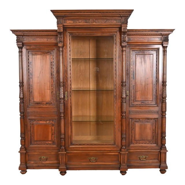 Herter Brothers Style Monumental Antique Eastlake Victorian Carved Walnut and Burl Wood Triple Bookcase Cabinet For Sale