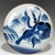 A fine antique Japanese Arita charger dating from the Edo period, decorated with a striking composition depicting a tiger...