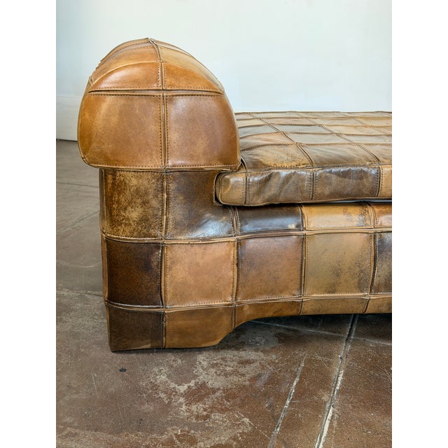 1970’s patchwork leather brown daybed / sofa in good vintage condition. Nice patina leather all around. Please feel free...