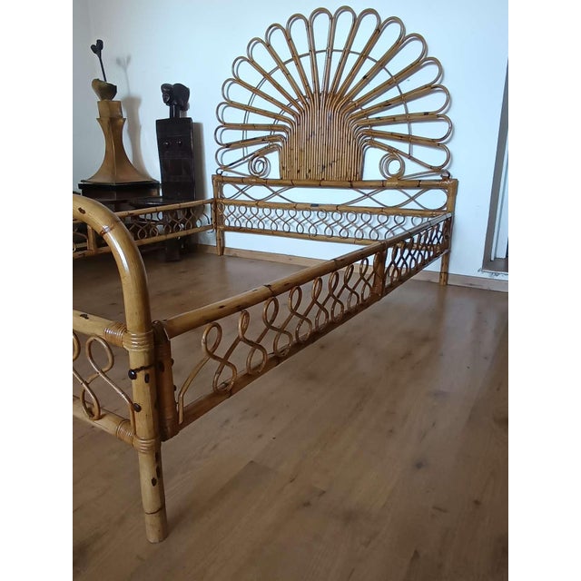 A rare, original Italian-made bamboo bed from the 1960s, still bearing the label of a shop located on a street in Rome’s...