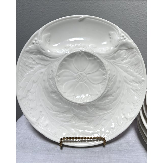 A set of six vintage white majolica artichoke plates produced in Gien, France. Beautiful examples of majolica--glazed...