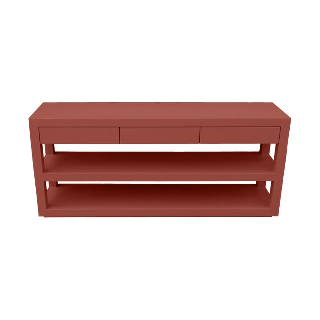 The essence of this well-designed console table lies in its open and spacious two-tier base. This design element not only...