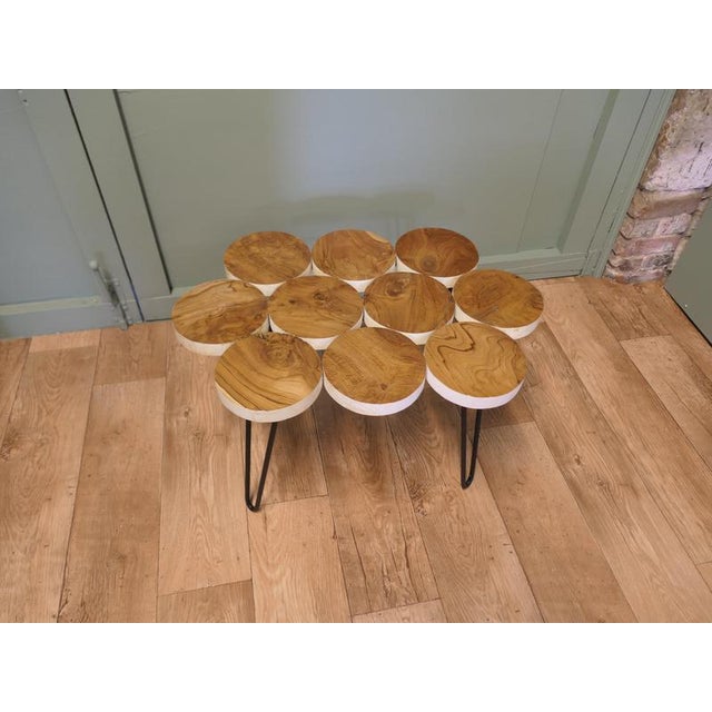 Wonderful Mid Century Folk Art Olive Wood Table The table top is made from slices of Olive wood which are screws together...