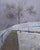 Winter Storm by Riley Doyle | Oil on panel Winter scene with a tree and snowy pathway. For Sale