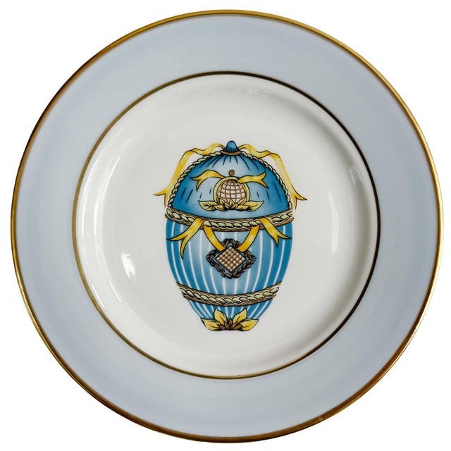 An exquisite set of four vintage French Limoges porcelain salad plates hand-decorated with eggs in the manner of Fabergé....