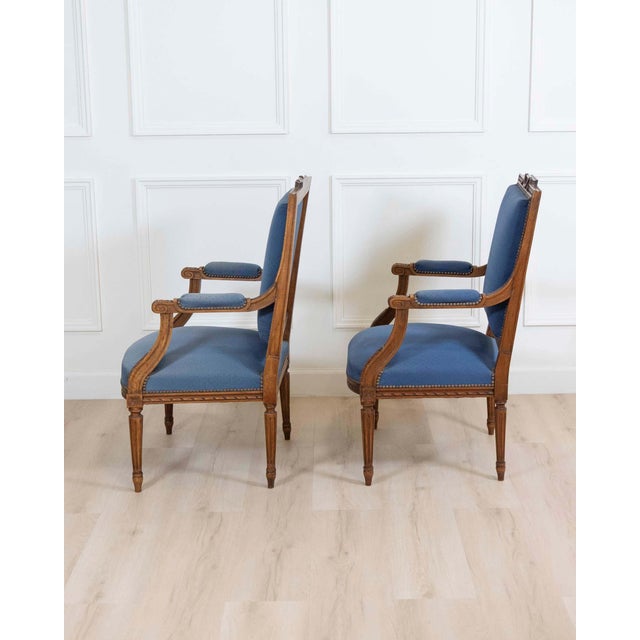 A beautiful set of four Louis XVI style fauteuils from the late 19th century, these elegant armchairs embody the symmetry,...