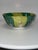This is a vintage Famille Verte Chinese porcelain bowl featuring a bok choy cabbage leaf design with a brass rim. Based on...
