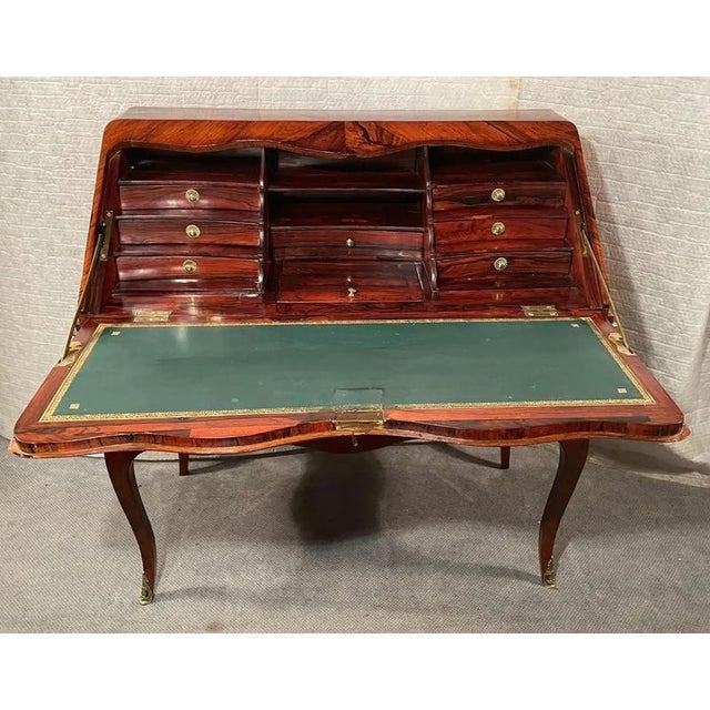 Step back in time with our exquisite 18th-century Louis XV Secretary Desk, a true masterpiece of French craftsmanship....