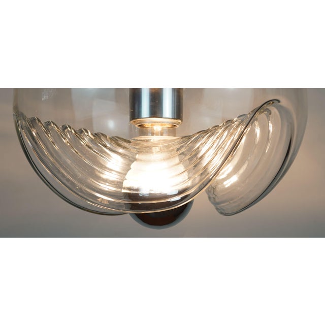 A fantastic mid-century pendant lamp by Peill & Putzler from the 1960s or 1970s, featuring a beautiful organic shape....