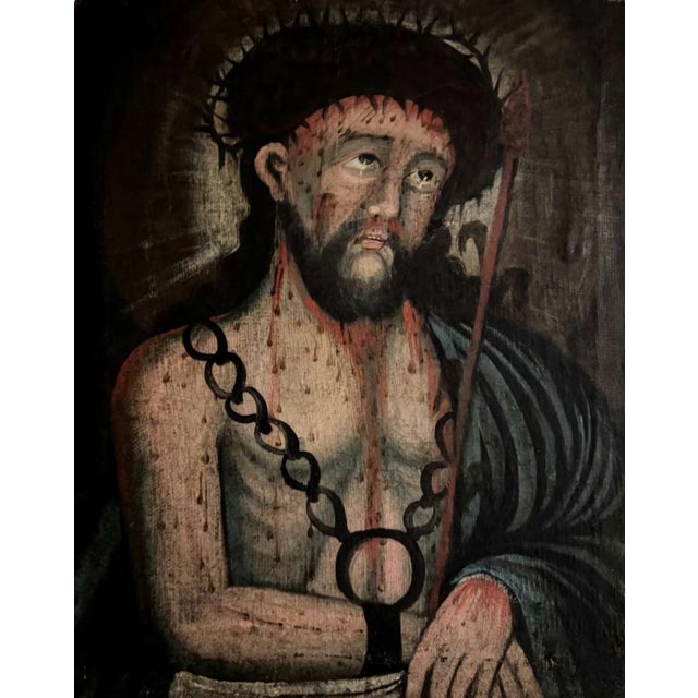 Intimate half-length devotional portrait of the Suffering Christ. Crown of thorns with dripping blood, single tear on...