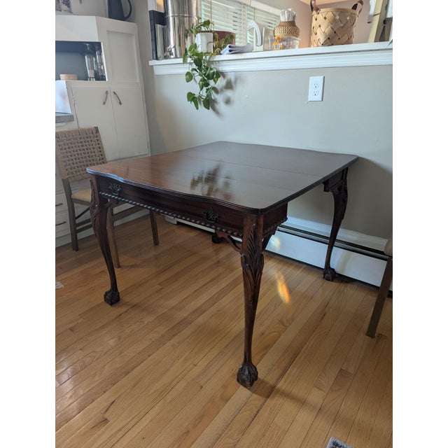 This is an incredibly unique and versatile antique table that has been passed down through my family for generations. It...