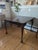 This is an incredibly unique and versatile antique table that has been passed down through my family for generations. It...