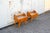Pair of bedside tables with wooden frames, brass details, and glass tops. Made in Italy 1950s