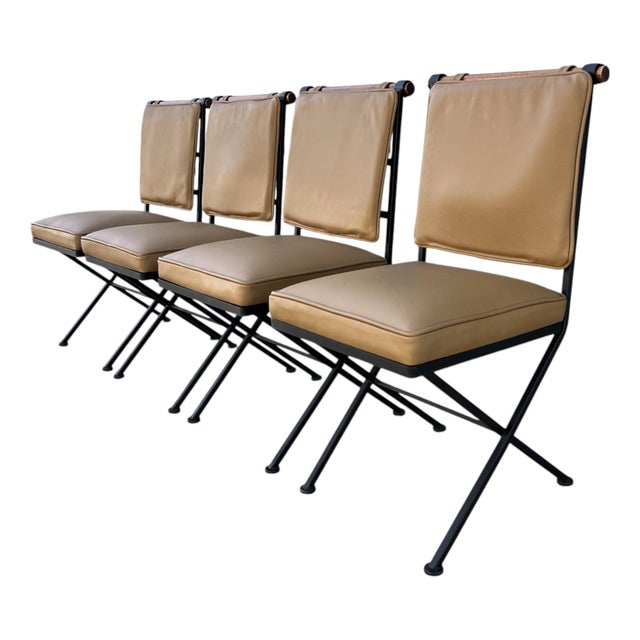 Bring bold architectural presence and timeless style to your space with this stunning set of four handcrafted dining...