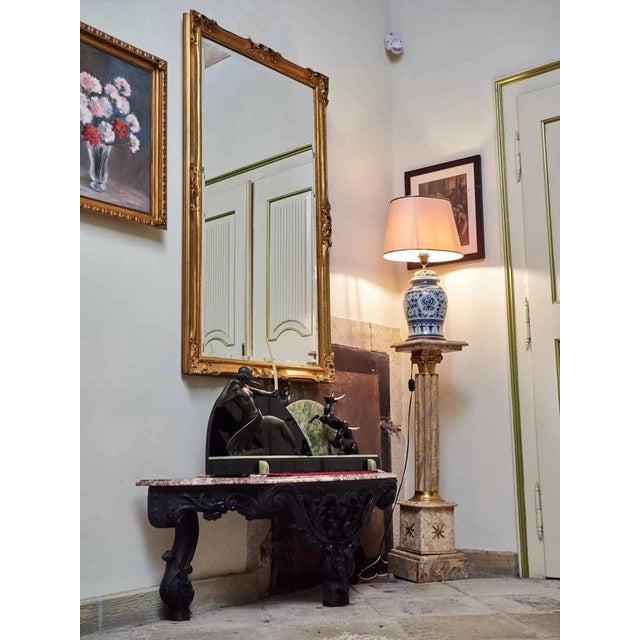Beautiful mirror decorated in Rococo style with gilded frame and faceted edges. Condition: excellent, no damage, no...