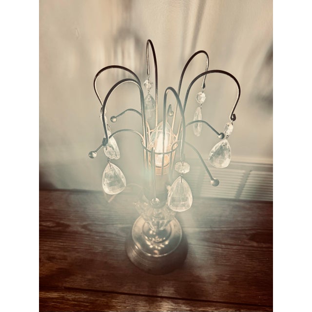 Striking vintage pair (price is for 2) of Hollywood Regency–style waterfall table lamps with cascading prism drops and...