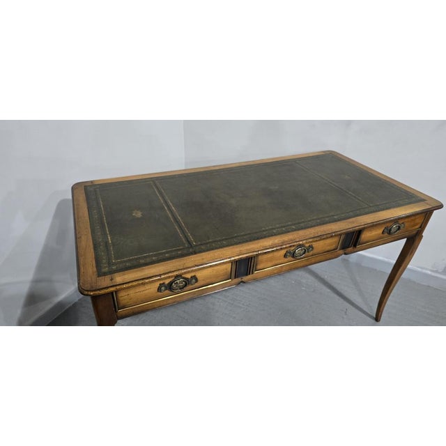 A very good French freestanding oak three drawer library desk, dummy drawers to the rear, green leather, in excellent...