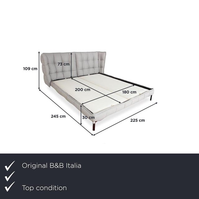 This set consists of the iconic b&b italia husk box spring bed in beige, two schramm divina 80 mattresses, and a matching...
