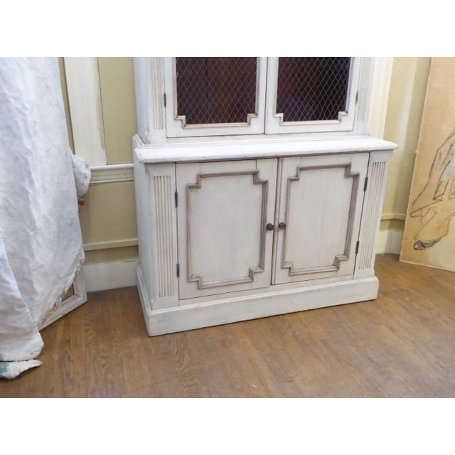 19th Century pine cabinet, neo-classical style, painted gray, with brass grill-work doors, top portion 52”H with three...
