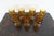 This vintage set of seven amber glass goblets by Indiana Glass features the iconic King’s Crown (Thumbprint) pattern, a...