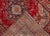 Beautiful vintage Persian Tabriz hand-knotted wool rug with a red field. This piece has a multi-color accent in an all-...