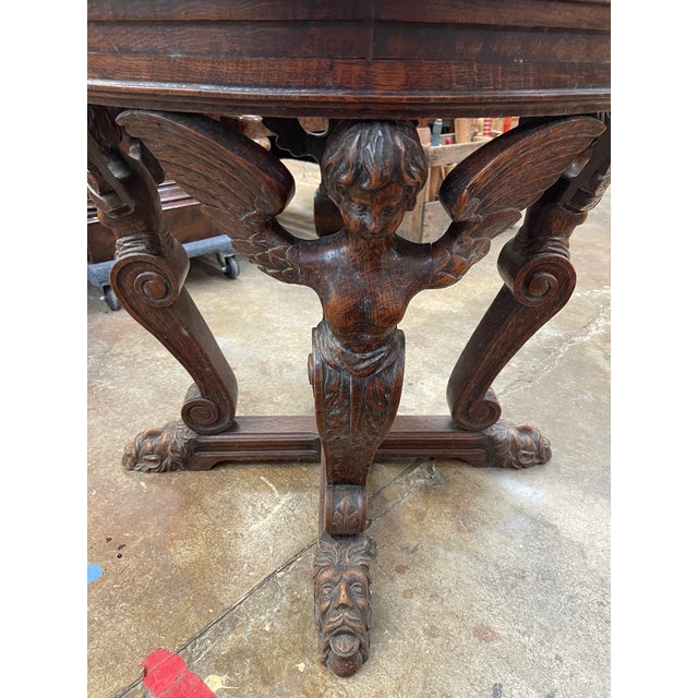 19th Century Baroque Round Oak Table With Winged Cherubs For Sale - Image 4 of 5