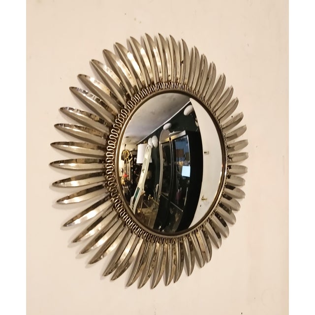 An iconic circular ‘sunburst’ mirror, a timeless classic of Mid-Century design. This piece stands out for the quality of...