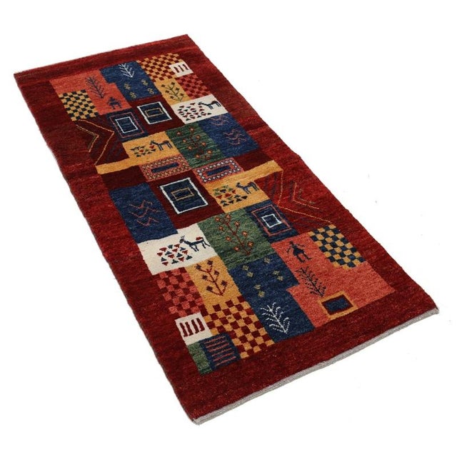 Gabbeh rugs are made by the nomadic Qashqai tribes of southern Iran. They are rough cut and long piled rugs of rich color...