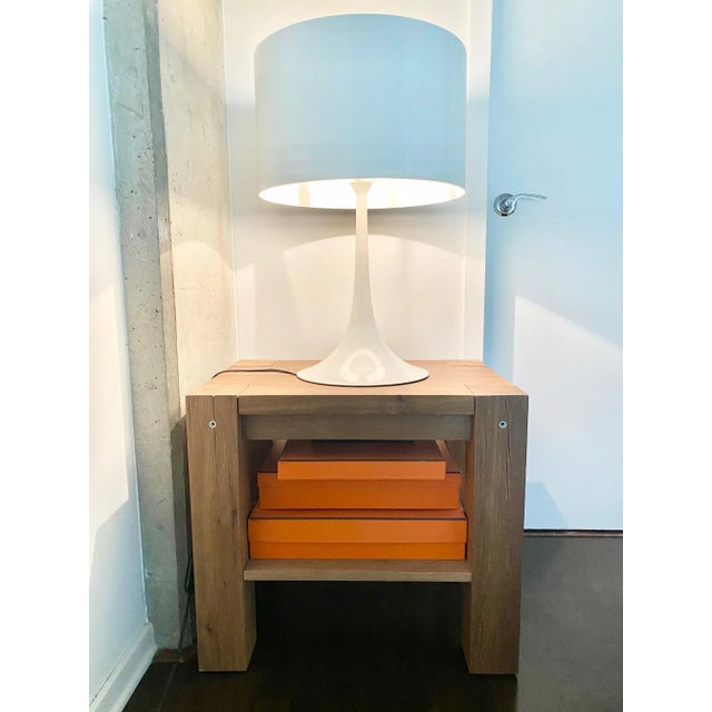 Crafted from solid European white oak, this beautifully made side table embodies understated luxury through its clean...
