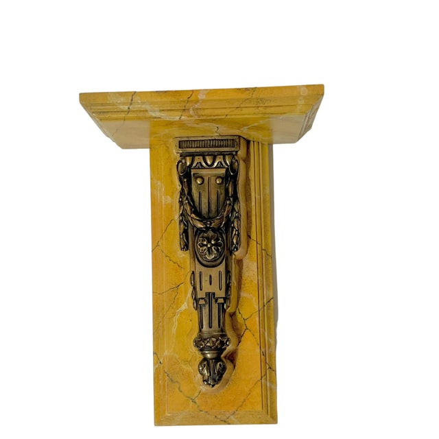 Vintage pair of faux finished wood and bronze brackets. Vintage bronze hardware has been applied to a faux finished wood...