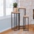 This table set features tall, narrow rectangular shapes. The bases are composed of graphite metal frames, each topped off...
