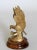 Vintage brass eagle sculpture on wood base. Marked "Made in India" on bottom. Some age wear to brass and wood.