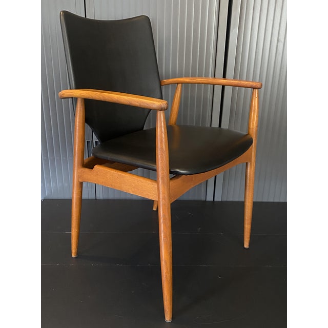 The listing is for one armchair, but four identical armchairs are available for sale. Solid teak frame, seat and back...