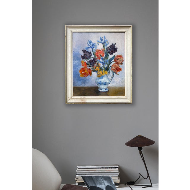 A very good painterly oil on board of a study of flowers in a Staffordshire blue and white jug. Signed MC - Mollie...